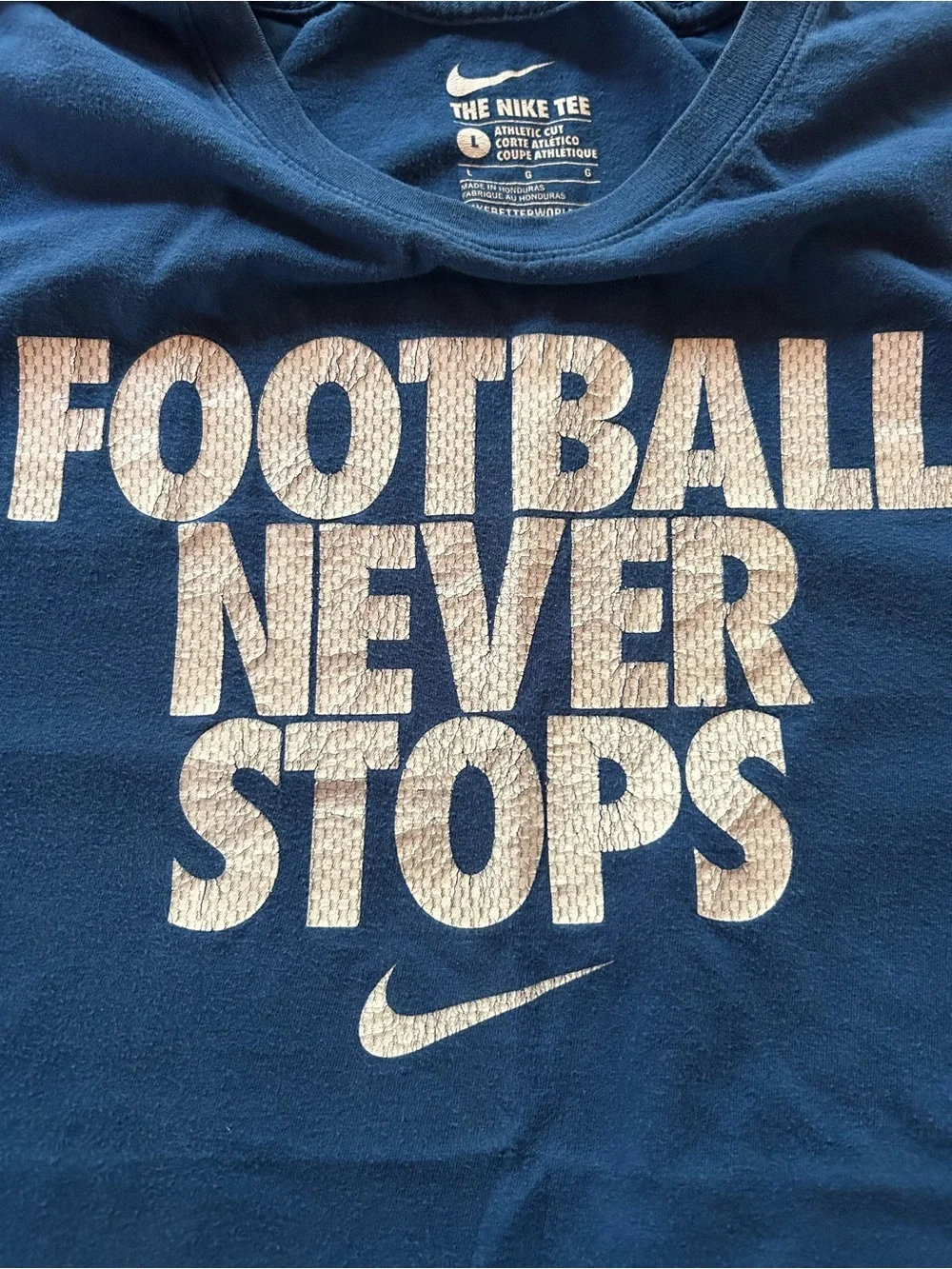 Nike Men's Navy Blue 'Football Never Stops' Short Sleeve Tee